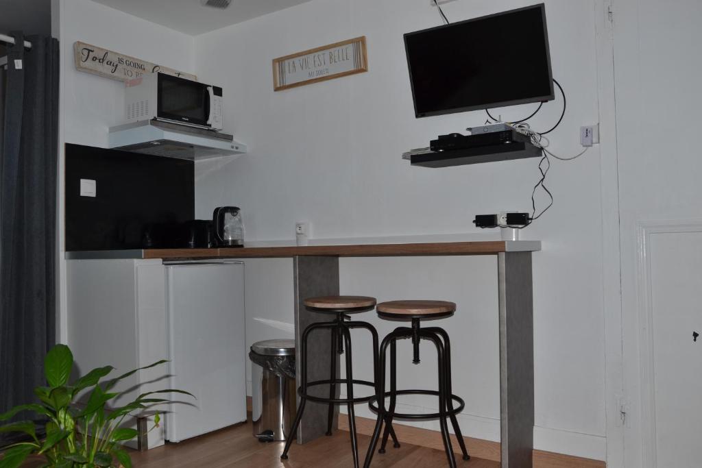 Kuchyň nebo kuchyňský kout v ubytování Appartement centre village vue mer - Relais Fleuri
