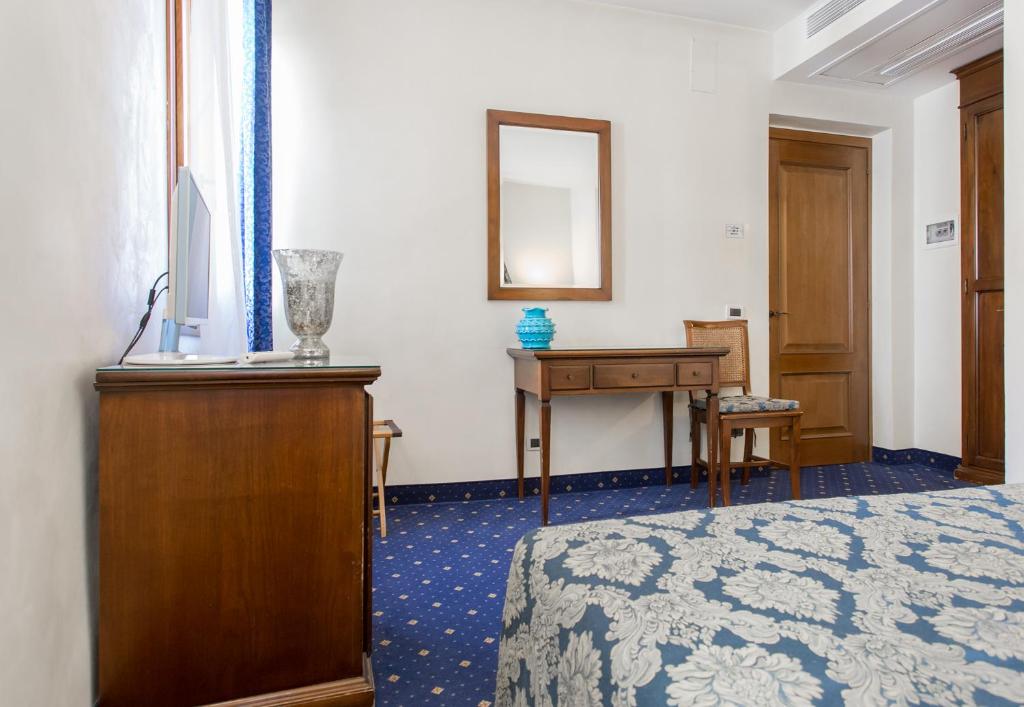 Postel nebo postele na pokoji v ubytování Residenza Rivo Alto