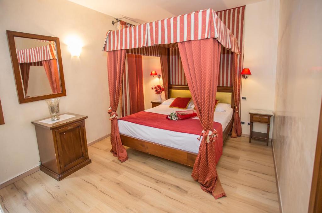 Postel nebo postele na pokoji v ubytování Residenza Rivo Alto
