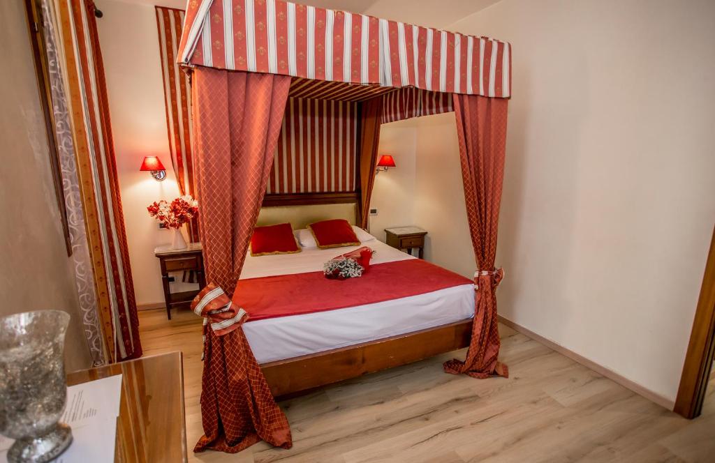 Postel nebo postele na pokoji v ubytování Residenza Rivo Alto