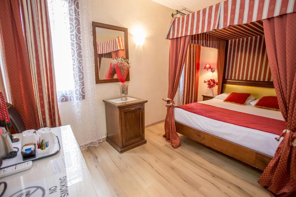 Postel nebo postele na pokoji v ubytování Residenza Rivo Alto