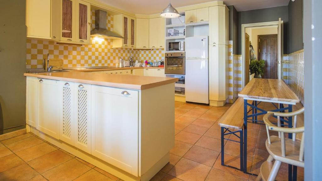 Kuchyňa alebo kuchynka v ubytovaní Casa Virgen del Carmen (VUT)