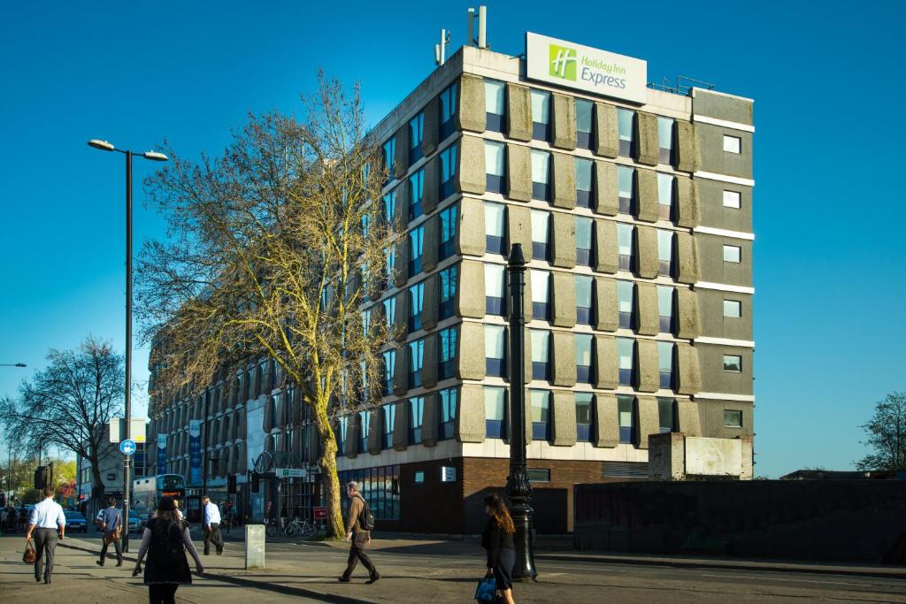 a building with people walking in front of it at Holiday Inn Express Bristol City Centre, an IHG Hotel in Bristol