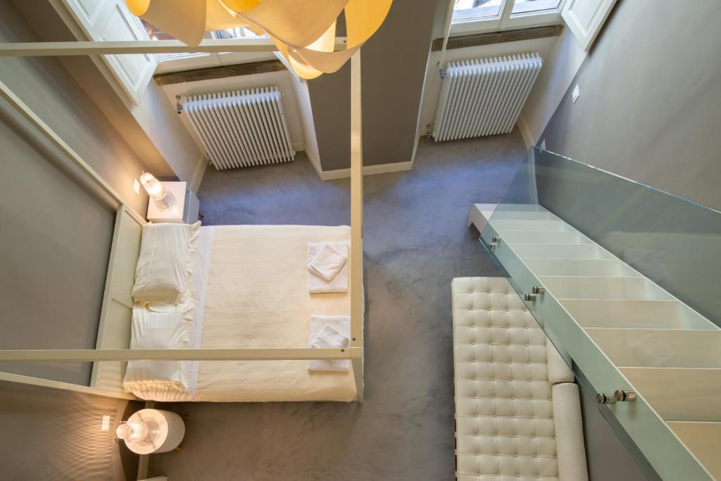 Posteľ alebo postele v izbe v ubytovaní Casa Velluti Deluxe by Mmega