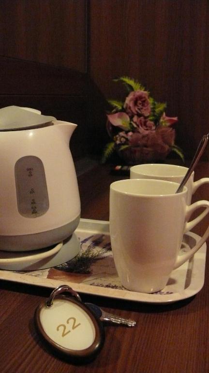 Příslušenství pro přípravu čaje a kávy v ubytování Hotel Leone