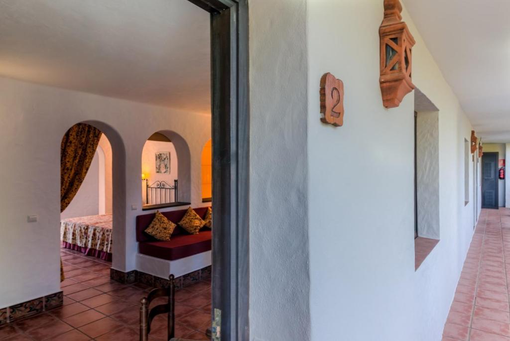 Posteľ alebo postele v izbe v ubytovaní Hacienda Roche Viejo