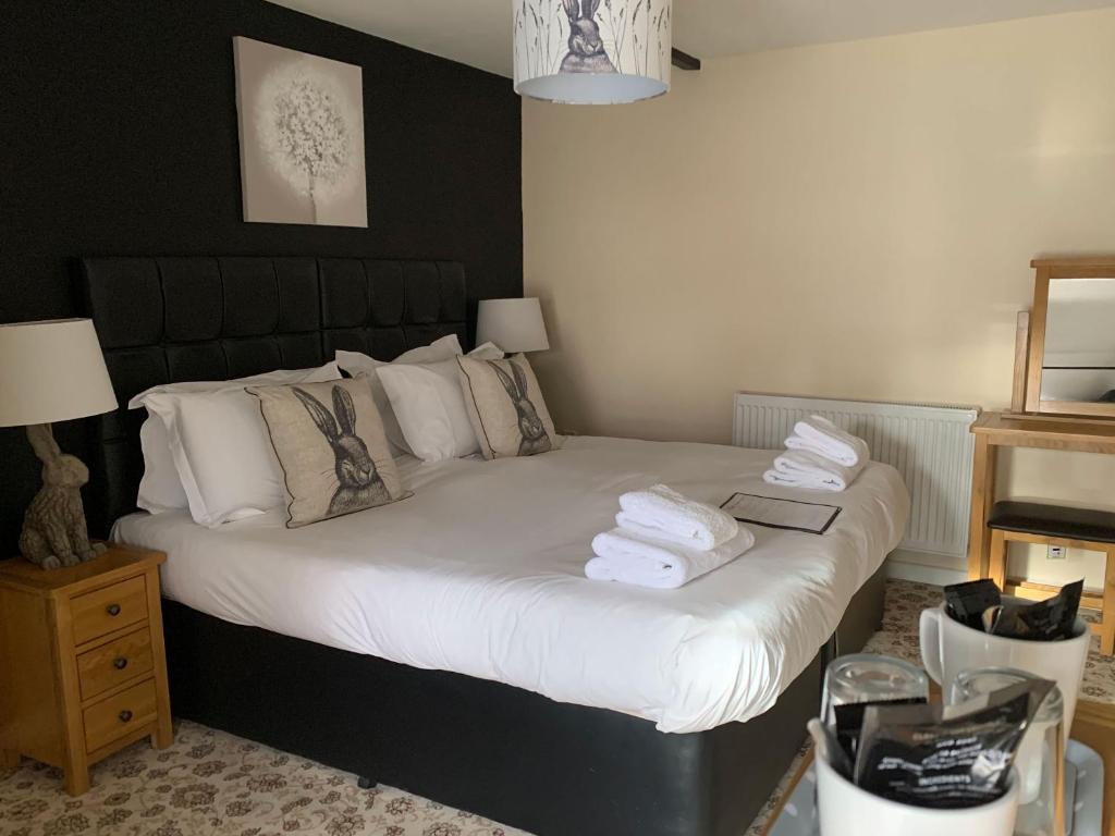 Postel nebo postele na pokoji v ubytování New Inn - Dorchester