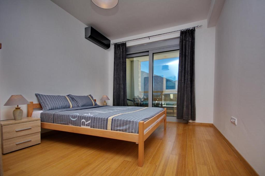 Postel nebo postele na pokoji v ubytování Apartment Dobrota