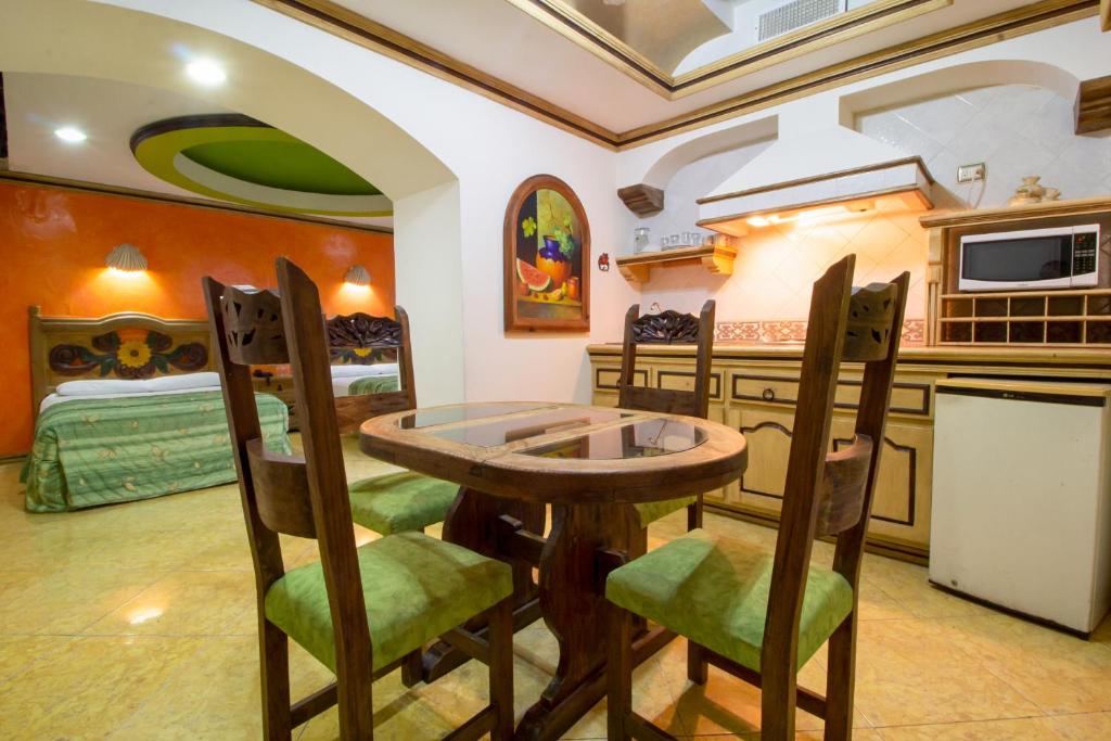 Kuchyň nebo kuchyňský kout v ubytování Suites Flamboyanes
