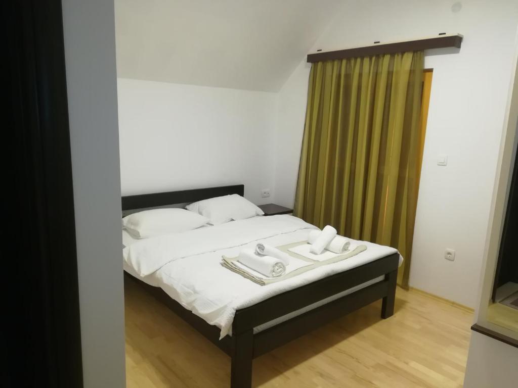 Postel nebo postele na pokoji v ubytování Vignjišta