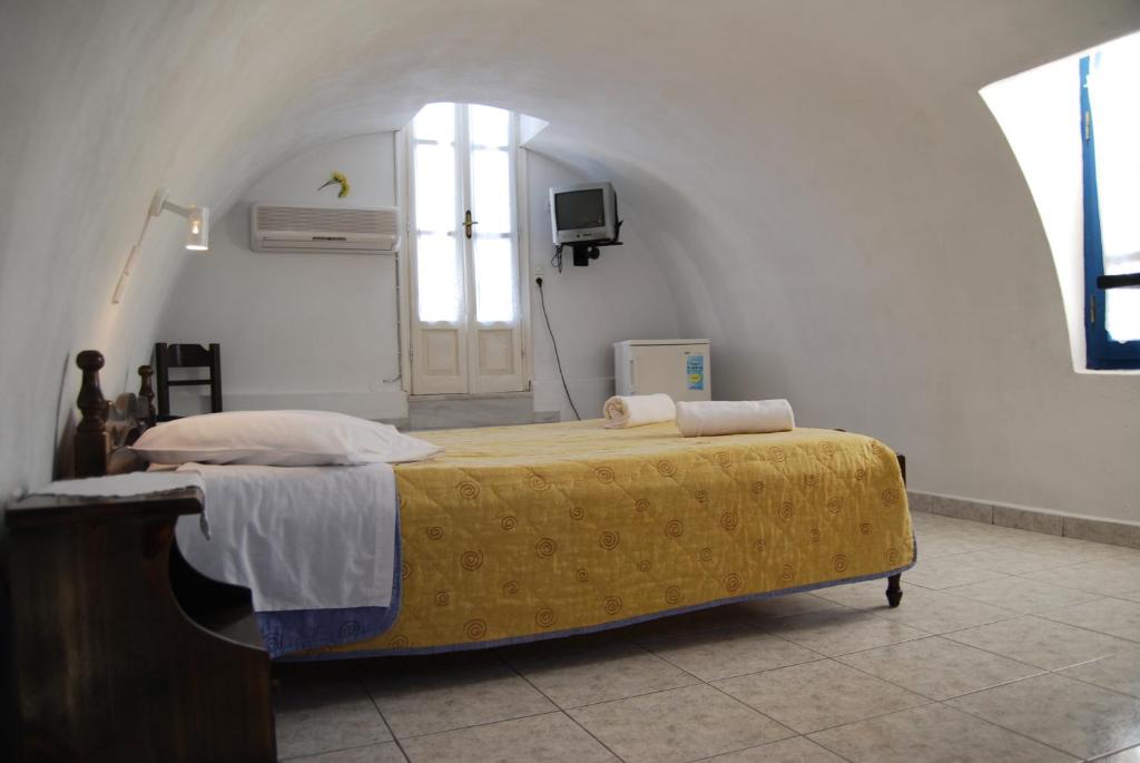 Letto o letti in una camera di Aretousa Villas