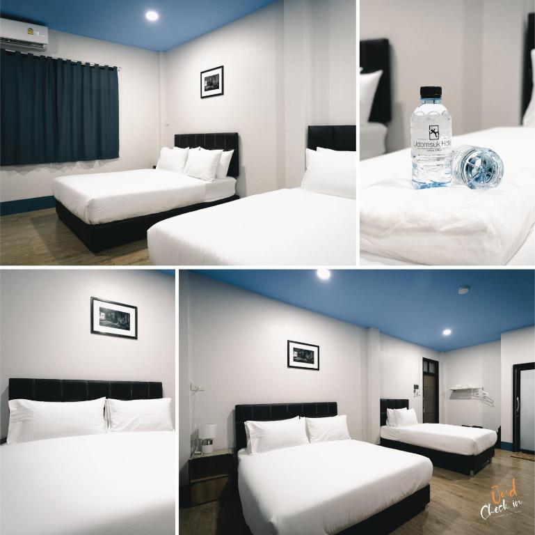 Postel nebo postele na pokoji v ubytování Udomsuk Hotel