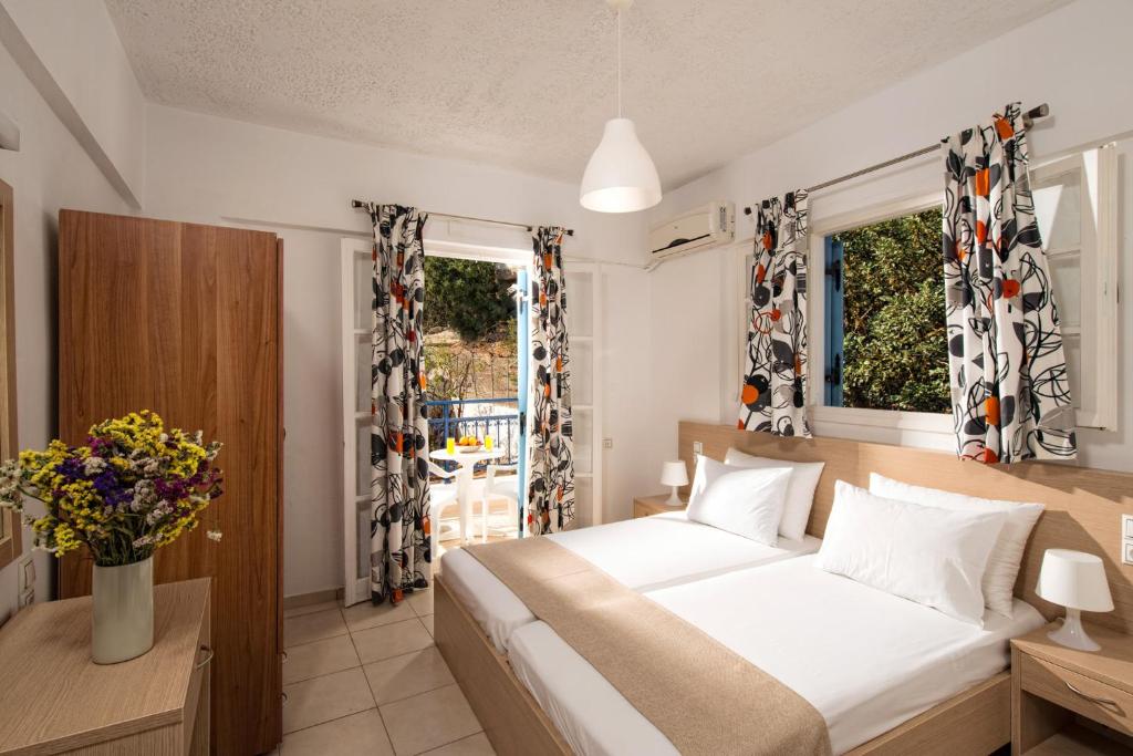 Кровать или кровати в номере Castello Apartments