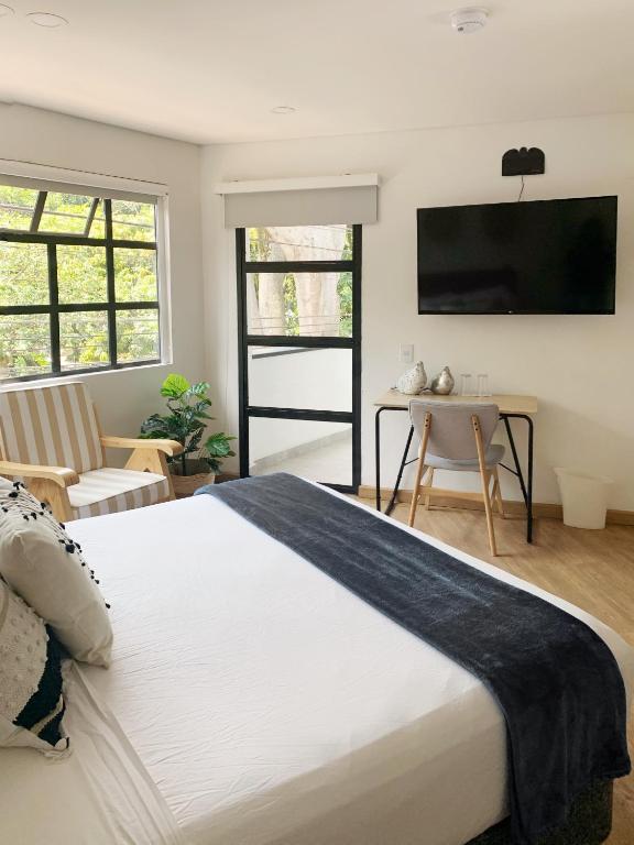 Postel nebo postele na pokoji v ubytování 574 Hotel