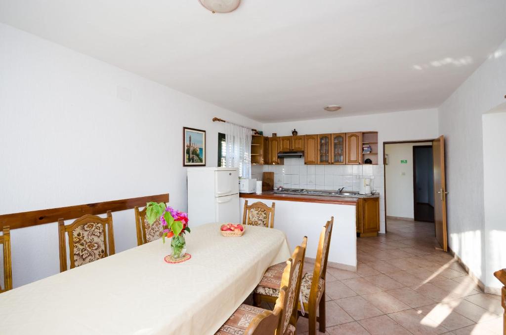 Kuchyň nebo kuchyňský kout v ubytování Apartments Boza