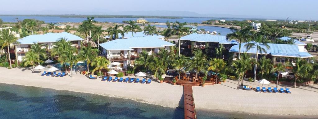 an aerial view of a resort on a beach at Chabil Mar Villas - Guest Exclusive Boutique Resort in Placencia Village