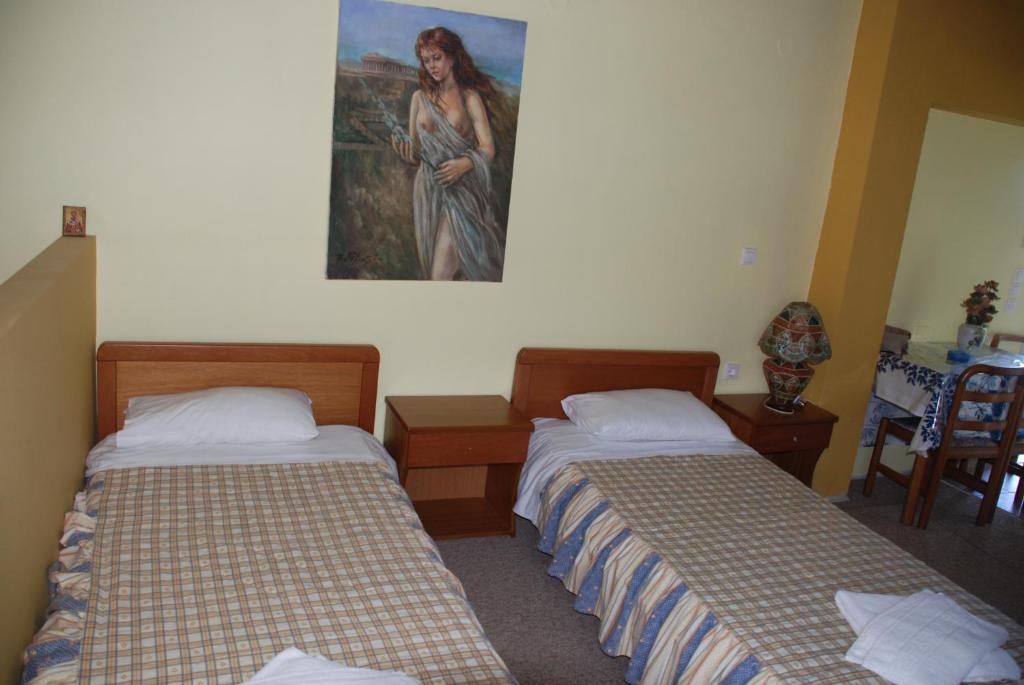 Postel nebo postele na pokoji v ubytování Marylin