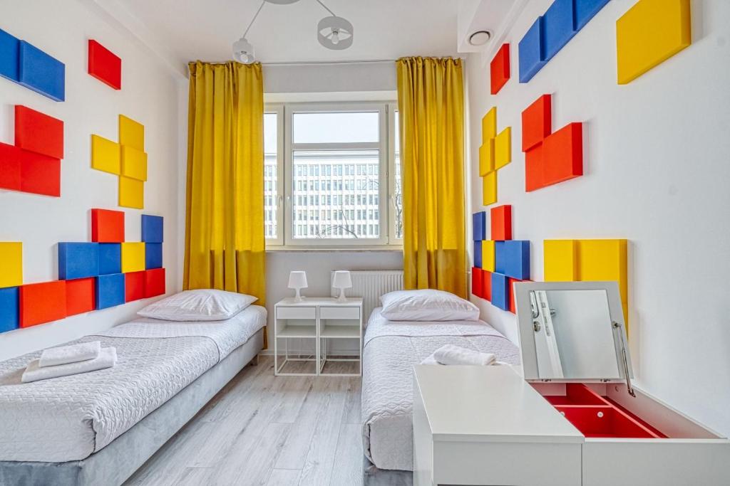 Postel nebo postele na pokoji v ubytování Level Rooms