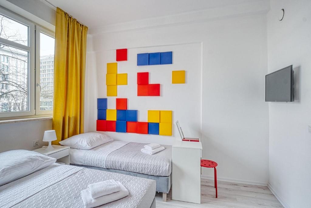 Postel nebo postele na pokoji v ubytování Level Rooms