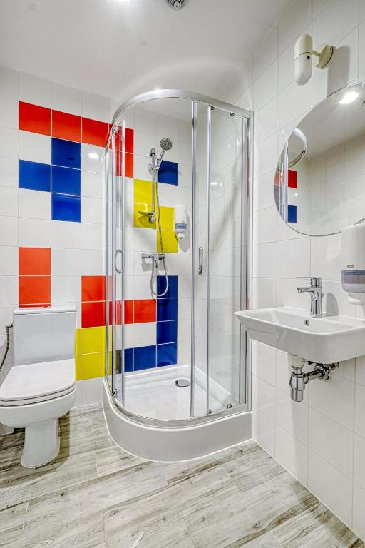 Koupelna v ubytování Level Rooms