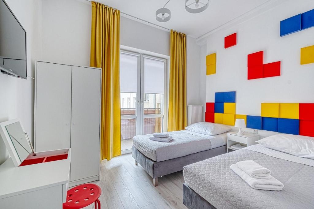 Postel nebo postele na pokoji v ubytování Level Rooms