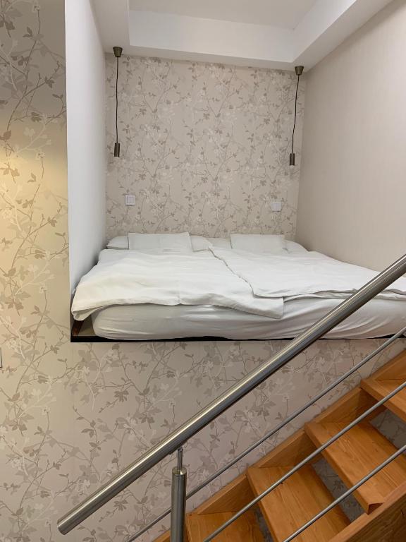 Postel nebo postele na pokoji v ubytování W19 Apartments