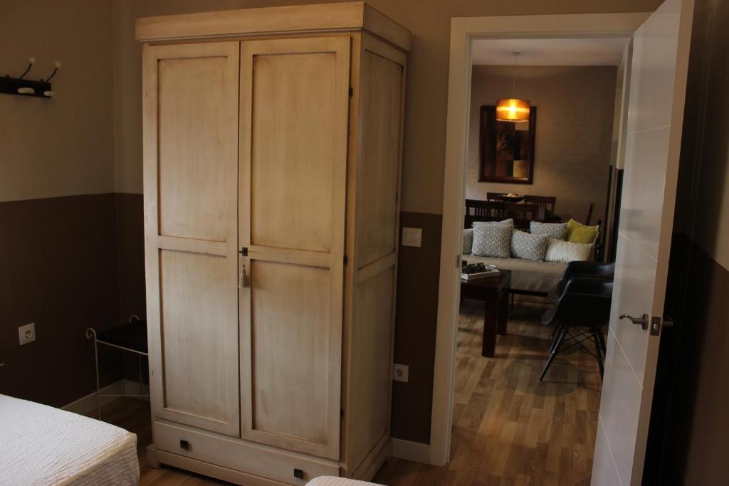 Posteľ alebo postele v izbe v ubytovaní Apartamentos Nundinae