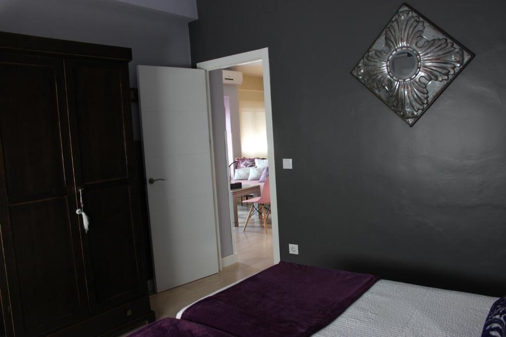 Posteľ alebo postele v izbe v ubytovaní Apartamentos Nundinae