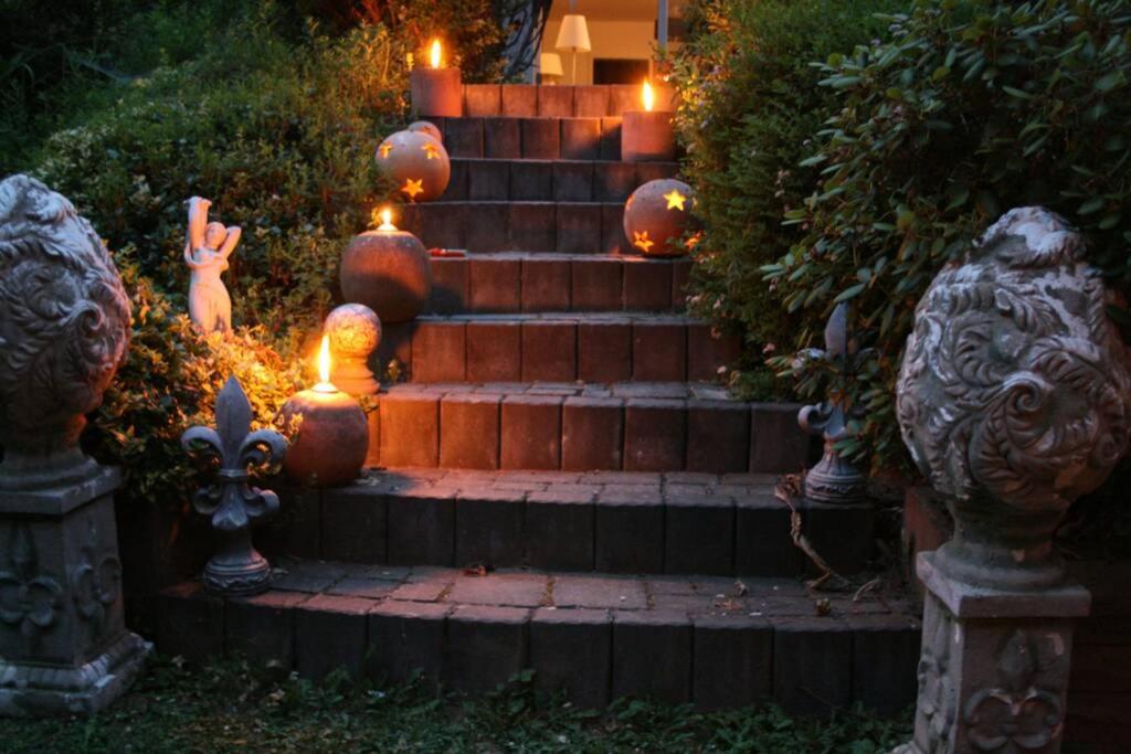 a set of stairs with lights on them at Gemütliches großzügiges Apartment in Höhr-Grenzhausen