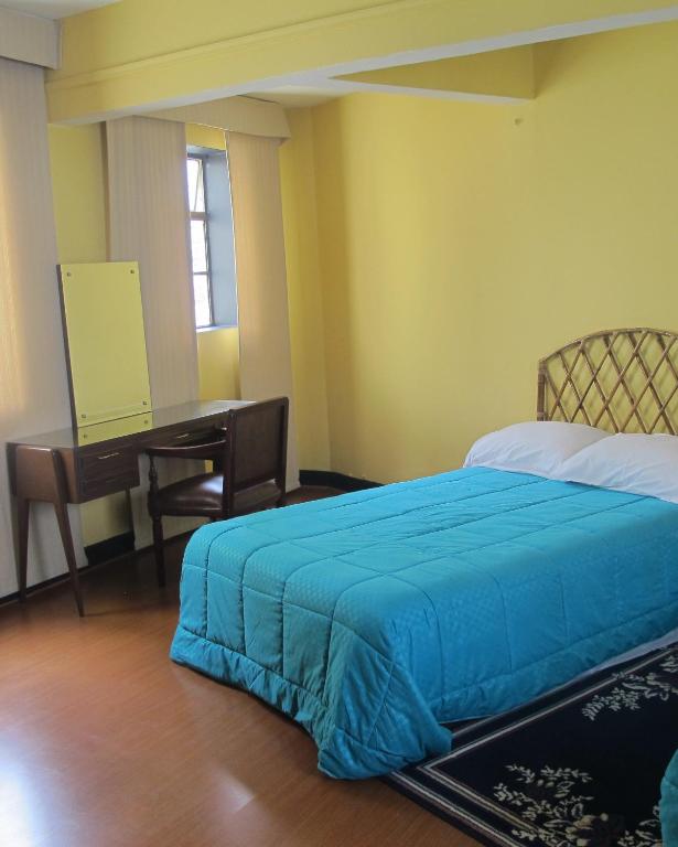 Postel nebo postele na pokoji v ubytování Hotel San Sebastian