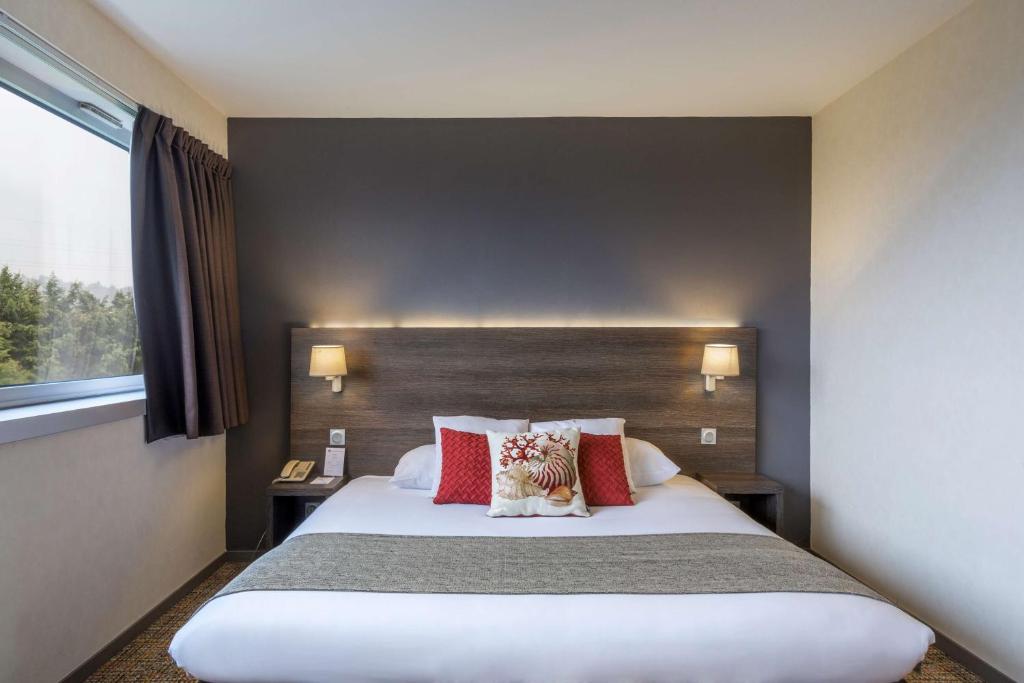 Postel nebo postele na pokoji v ubytování Best Western Plus Hotel Admiral