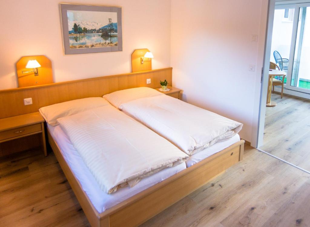 Postel nebo postele na pokoji v ubytování Hotel Portjengrat