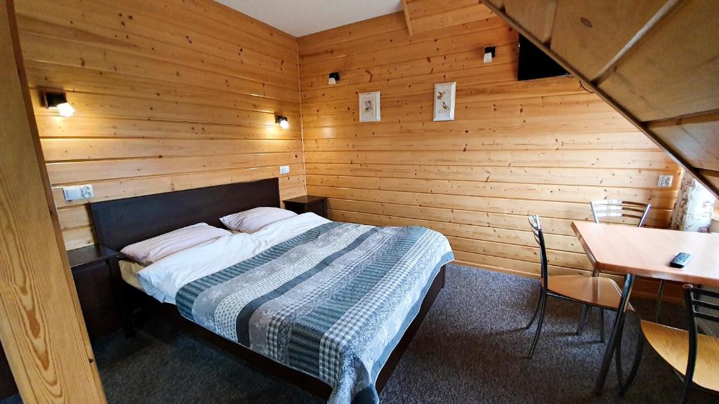 Postel nebo postele na pokoji v ubytování Agroturystyka u Jarka