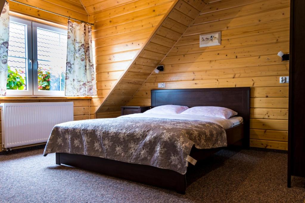 Postel nebo postele na pokoji v ubytování Agroturystyka u Jarka