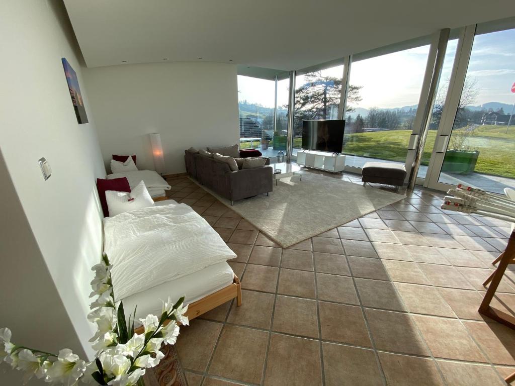 Posezení v ubytování Exklusive Mini-Villa mit viel Platz