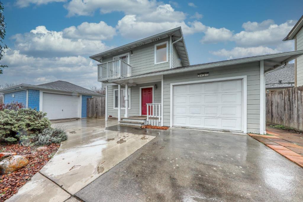 a gray house with a white garage at Seventh Street Select in Eureka
