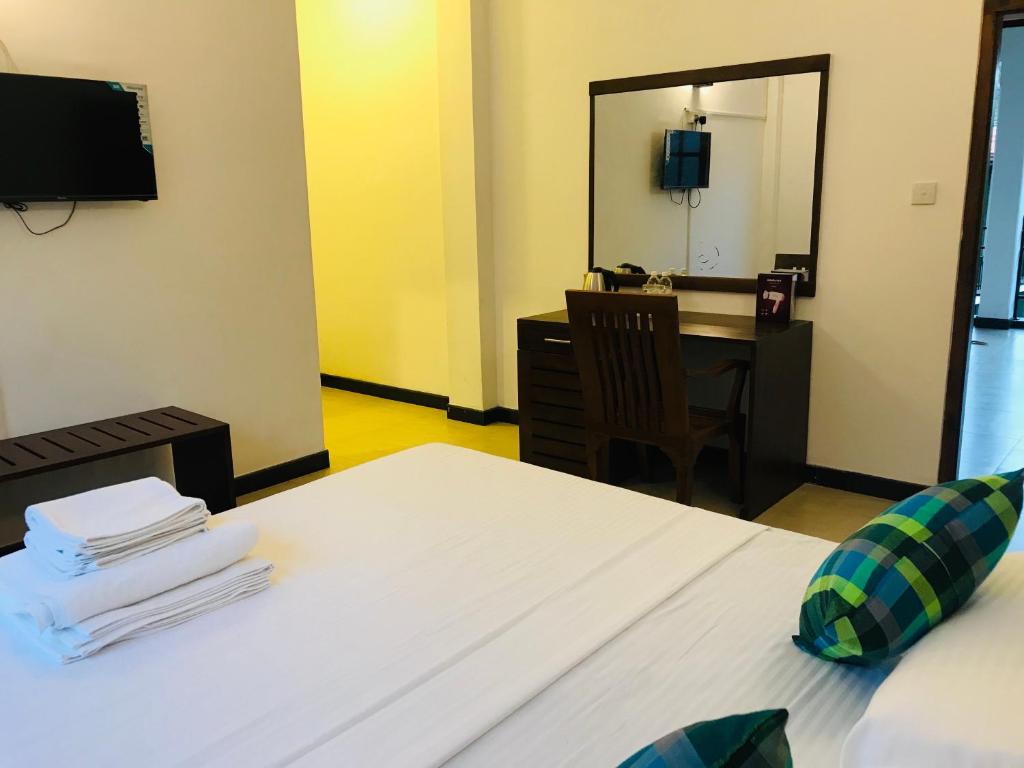 Postel nebo postele na pokoji v ubytování Ravan Resort Tangalle