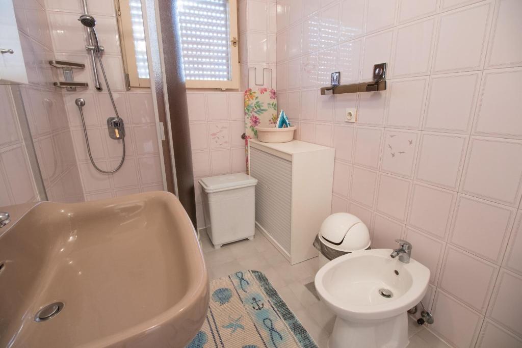 Kúpeľňa v ubytovaní Apartment Kralj