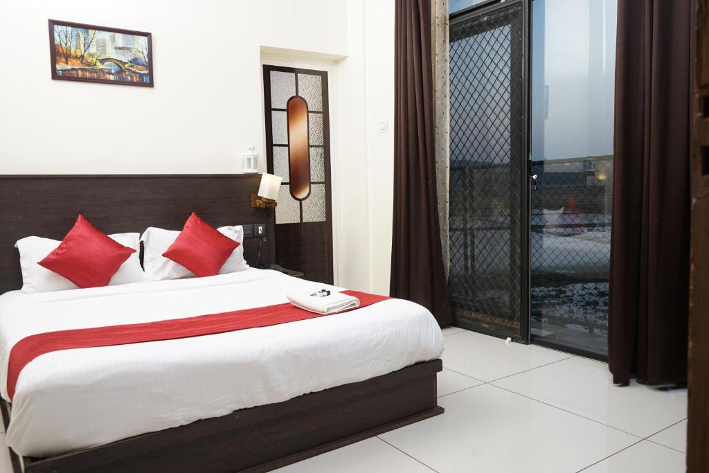 Giường trong phòng chung tại Paddyfield Inn