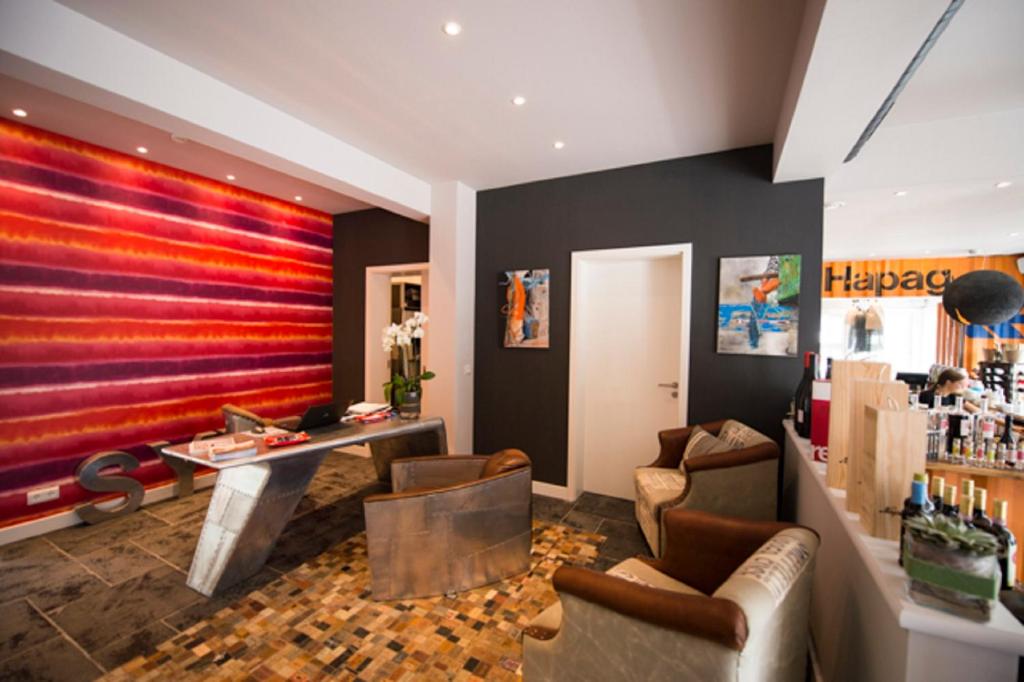 Posezení v ubytování Das 54 Grad Nord - Apartments & More