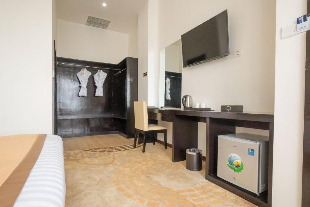 TV a/nebo společenská místnost v ubytování Hotel Sanchaung