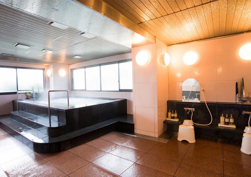 Postel nebo postele na pokoji v ubytování Hotel Suncrest
