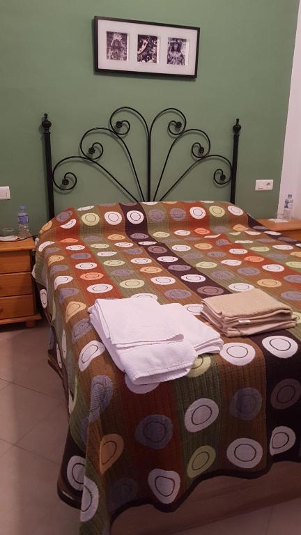 Un pat sau paturi într-o cameră la Casa los Tres Aires