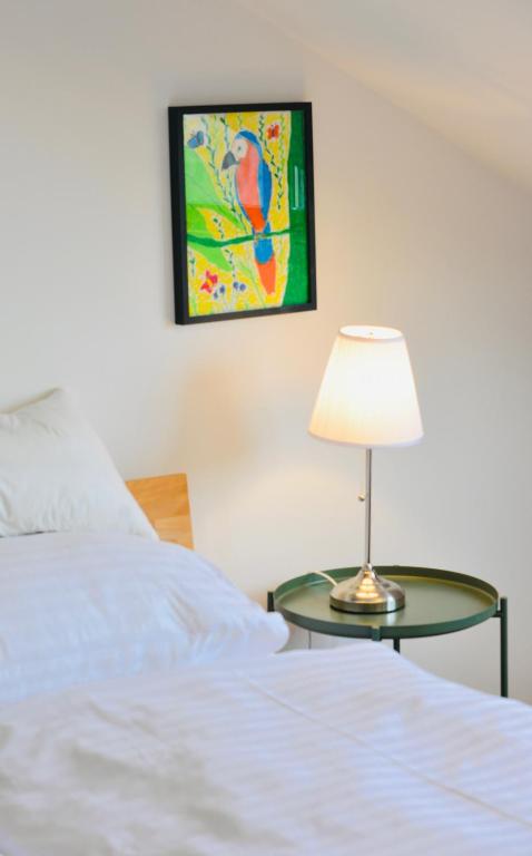 Posteľ alebo postele v izbe v ubytovaní Charming Attic Apartment near Messe Wien and Center