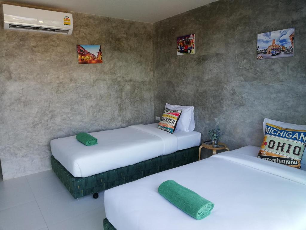 Postel nebo postele na pokoji v ubytování Laemsai Resort
