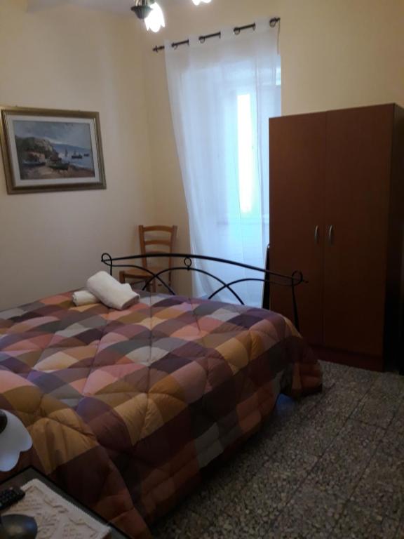 Posteľ alebo postele v izbe v ubytovaní L'Antico Faro
