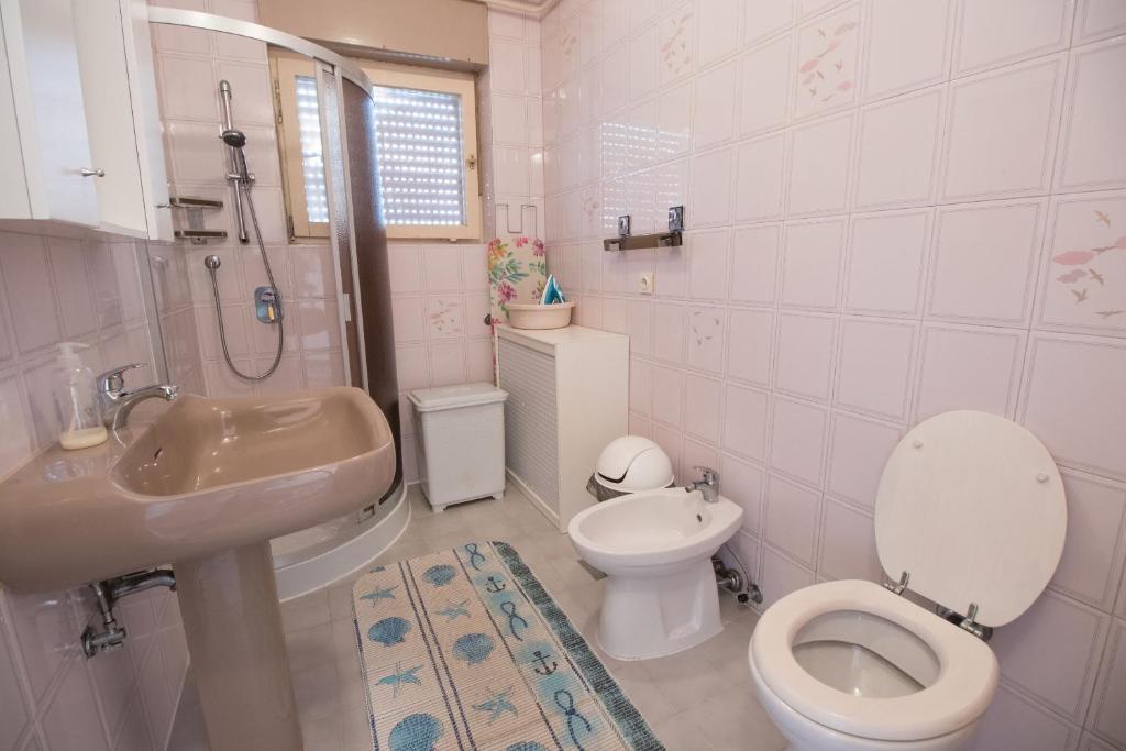 Kúpeľňa v ubytovaní Apartment Kralj