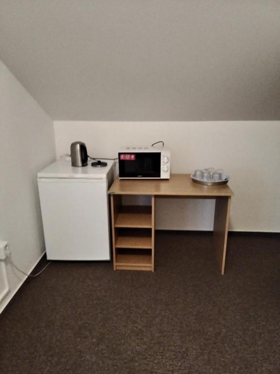 Kuchyň nebo kuchyňský kout v ubytování Kulturně Společenské Centrum