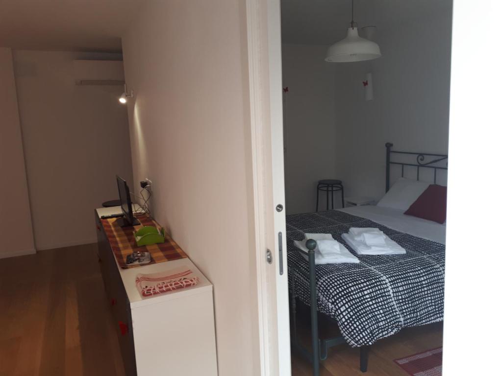 Postel nebo postele na pokoji v ubytování B&b Campus