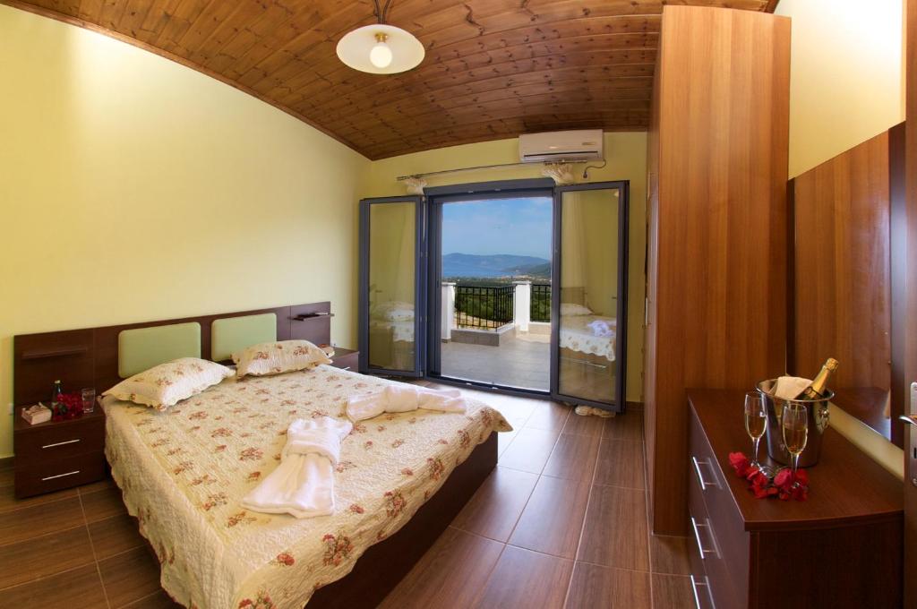 Postel nebo postele na pokoji v ubytování Sunrise Villa